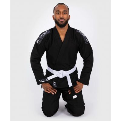 Premium Vector  Set of bjj kimonos in different colors with black belt  vector realistic illustration white black